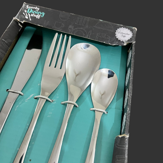 Set of silver cutlery including knife, fork, and two spoons in a teal box with 'Swanky Dining Stuff' branding.