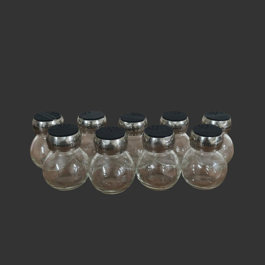 A Set of 09 Spice Jars